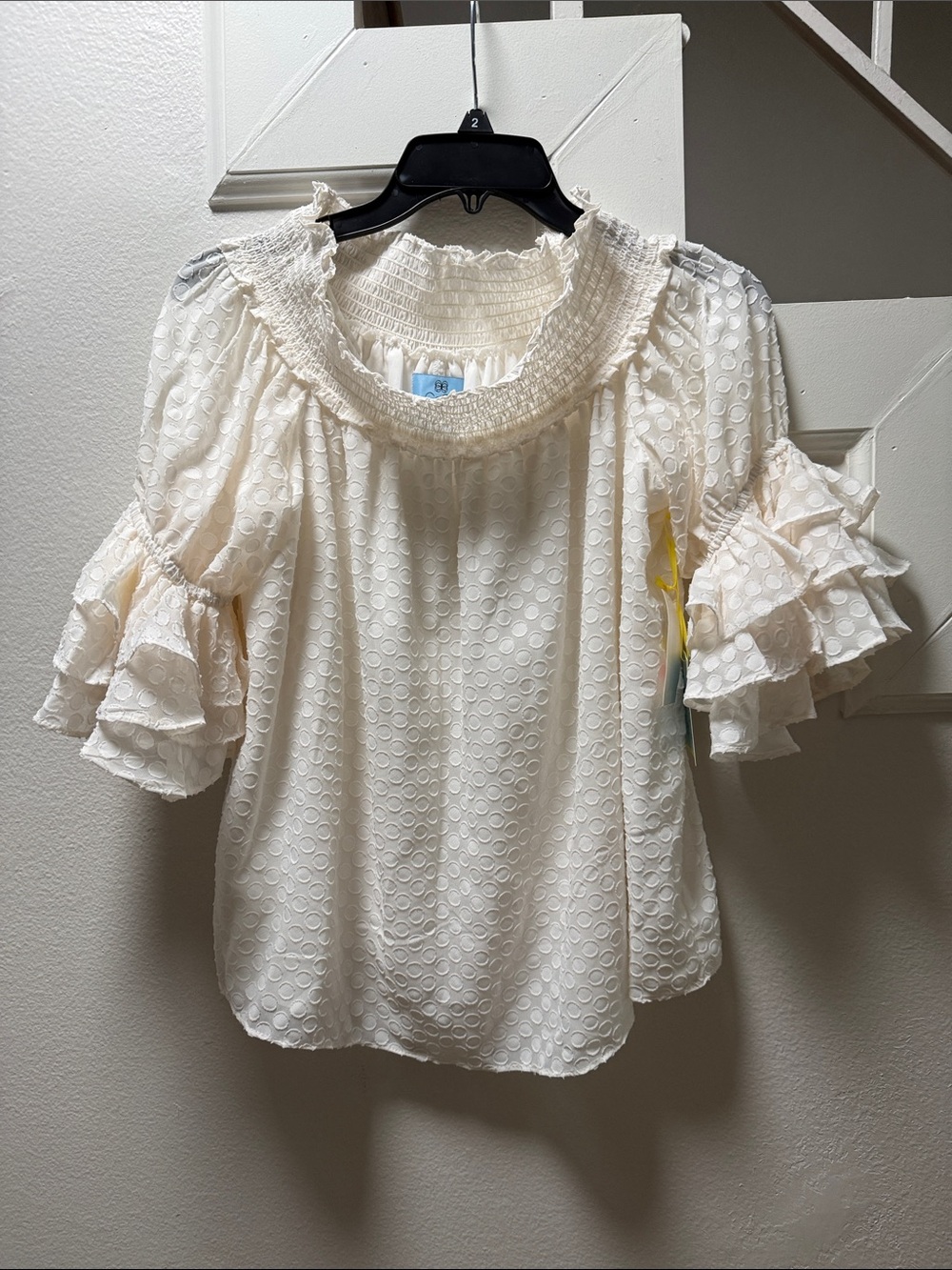 CeCe Ivory Smocked Ruffle Neck Blouse with Tiered Sleeve Ruffles - Picture 4 of 7